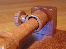 A detail from the reel holder with the cut-away for the reel in the ring A detail from the reel holder with the cut-away for the reel in the ring