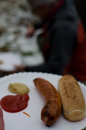 Sausage and bread on the beach Sausage and bread on the beach
